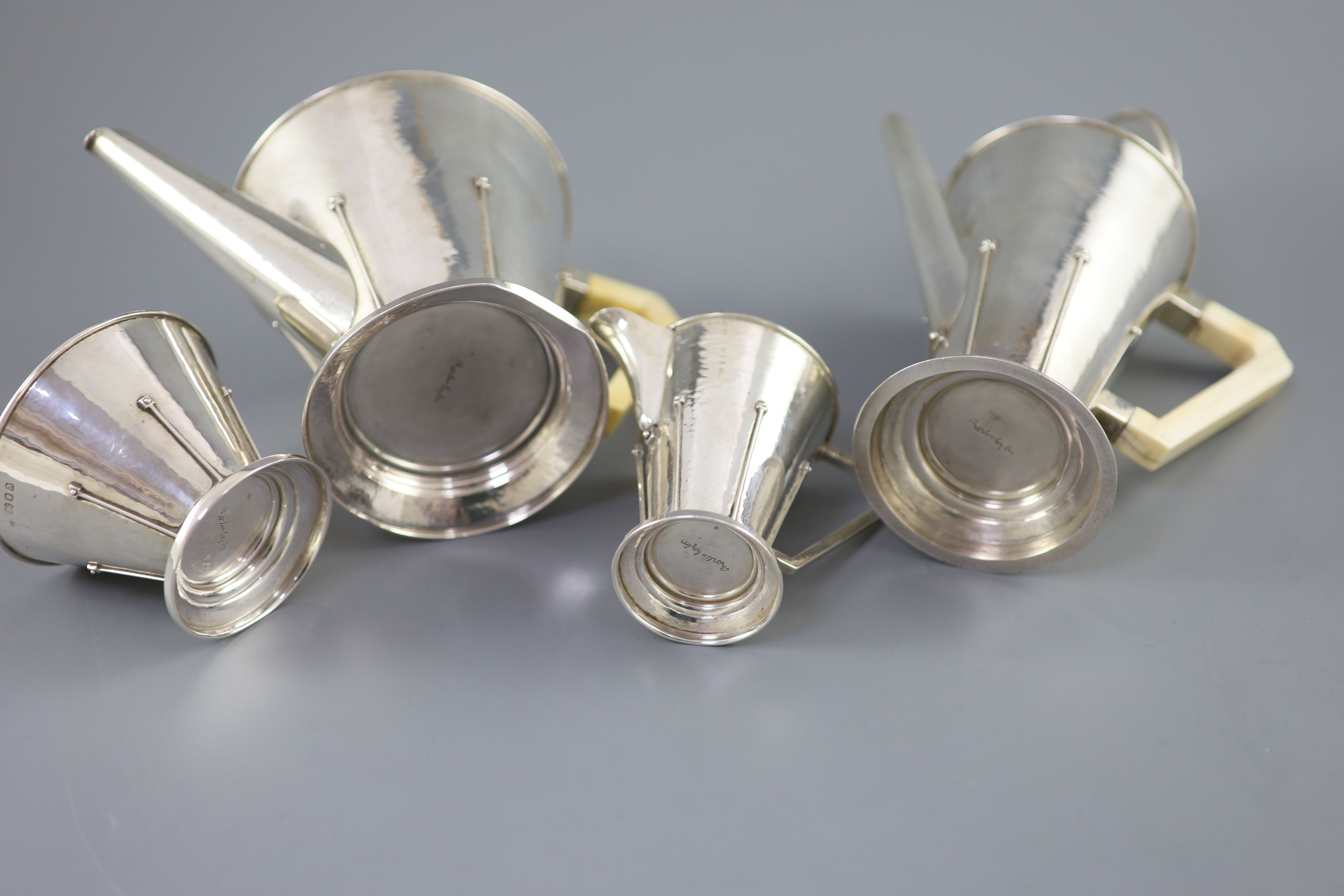A stylish 1930s Art Deco silver four piece tea and coffee service by Charles Boyton,